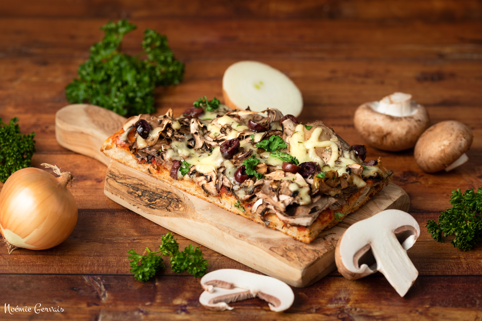 Photographe culinaire Part de pizza aux champignons